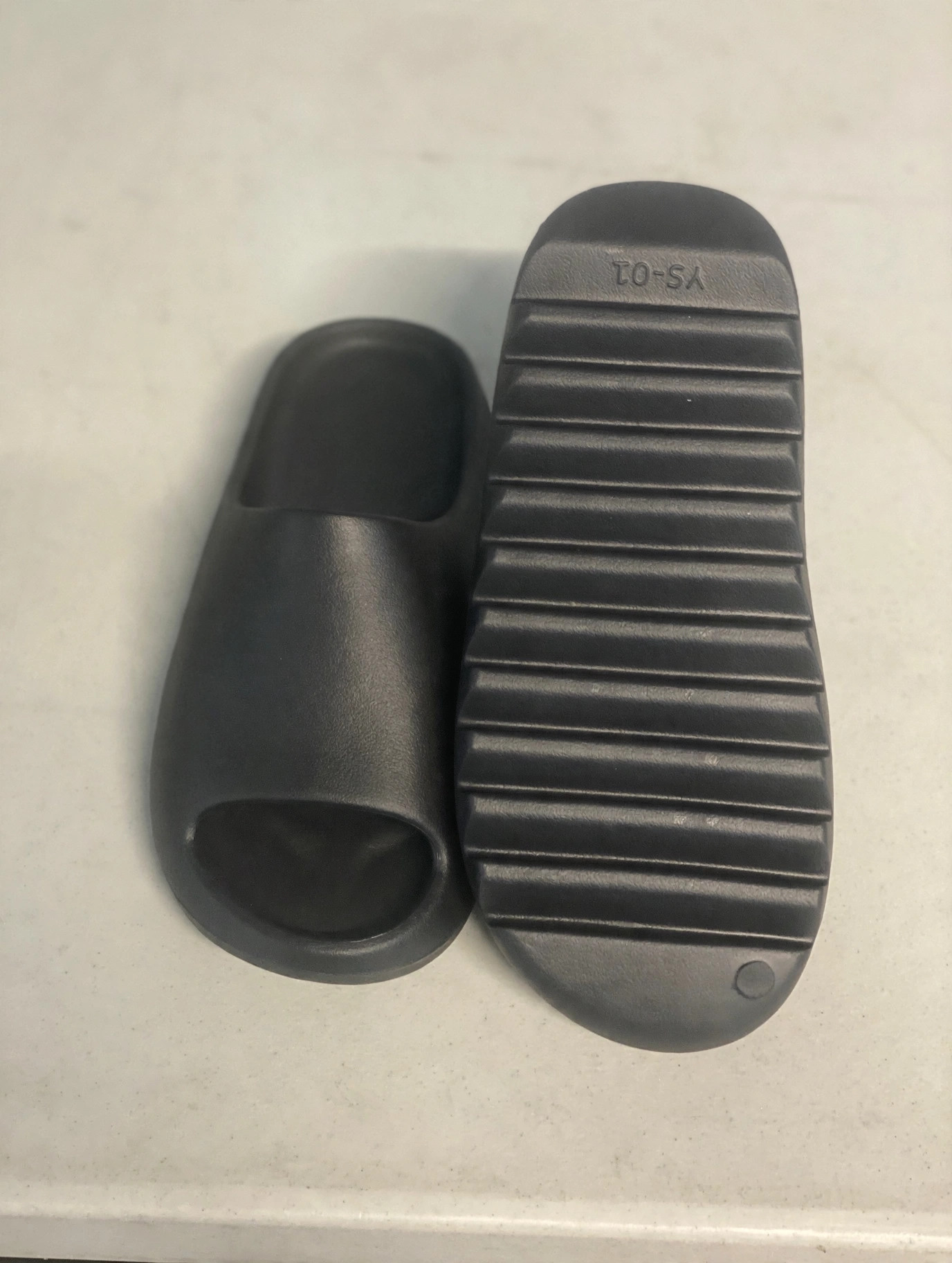 Close-up of the tread and YS-01 outsole marking